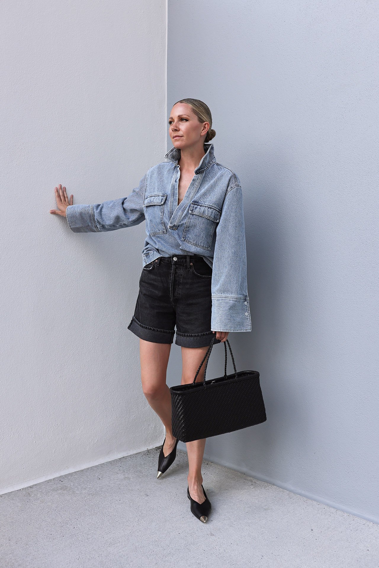 agolde black long denim, oversized shirt, pointy flats, best denim shorts